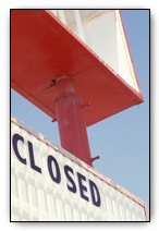 Store with closed sign